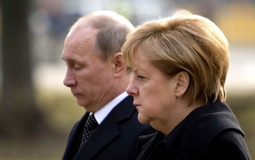 Путин и Меркель обсудили ситуацию в Украине и снятие санкций 